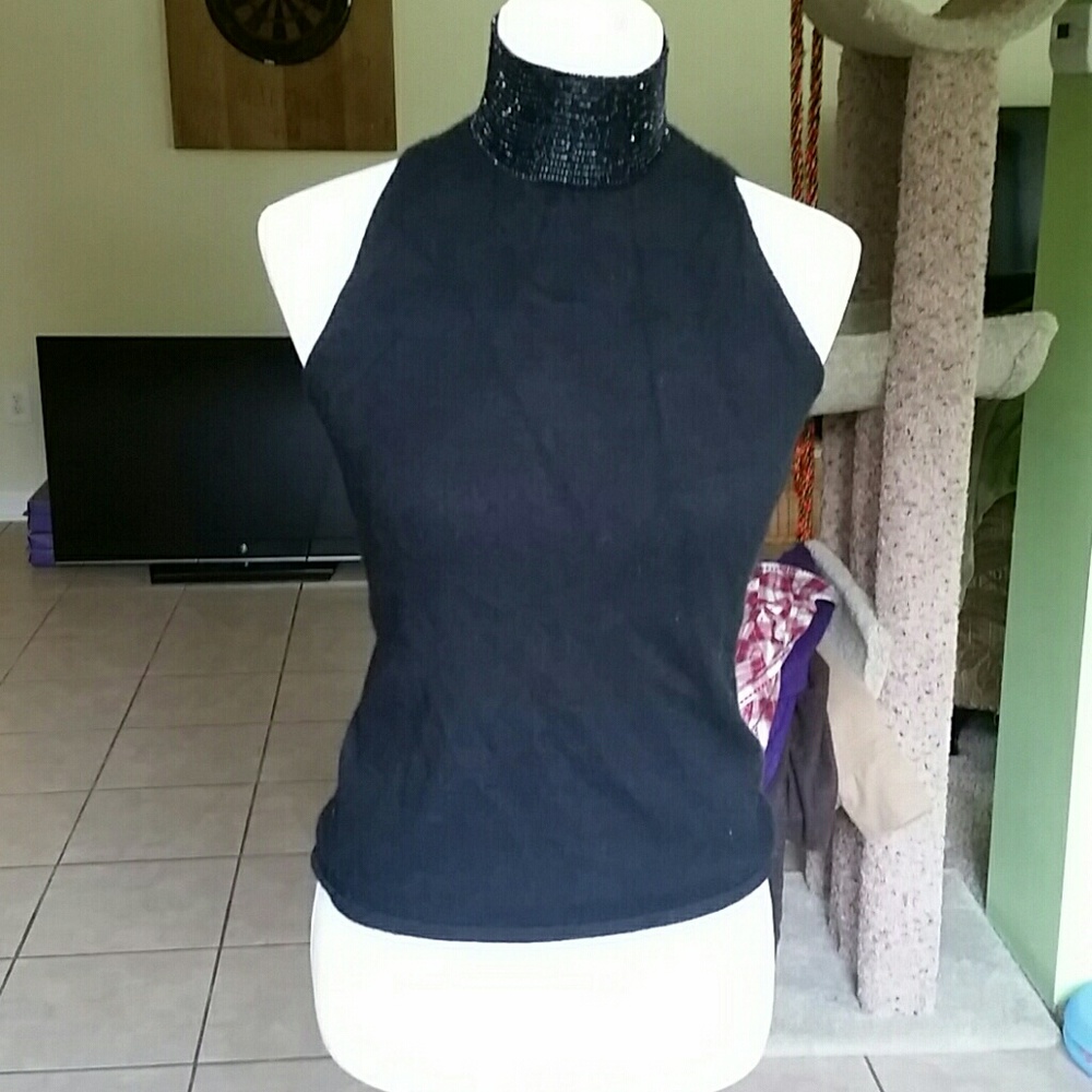 Ralph Lauren, sleeveless, cashmere sweater.